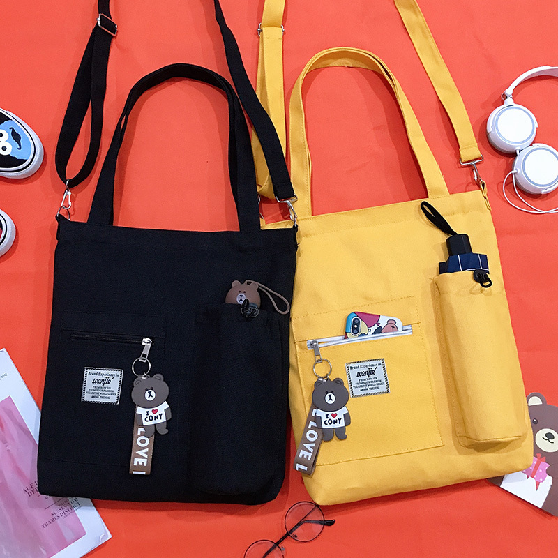 Bolsa de lona de las mujeres bolsa de mensajero estudiante japonés ins estilo bolso de hombro coreano simple todo-fósforo bolso de gran capacidad