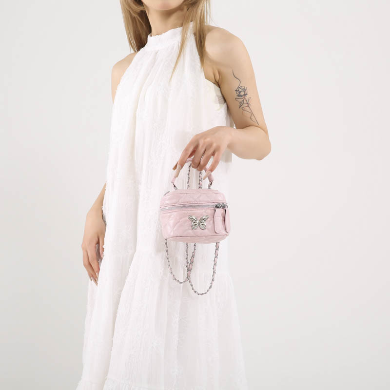 Nicho de diseño bolso de mano mujer 2024 nueva primavera y verano moda lingue mini bolso de cubo cadena bolso de mochila