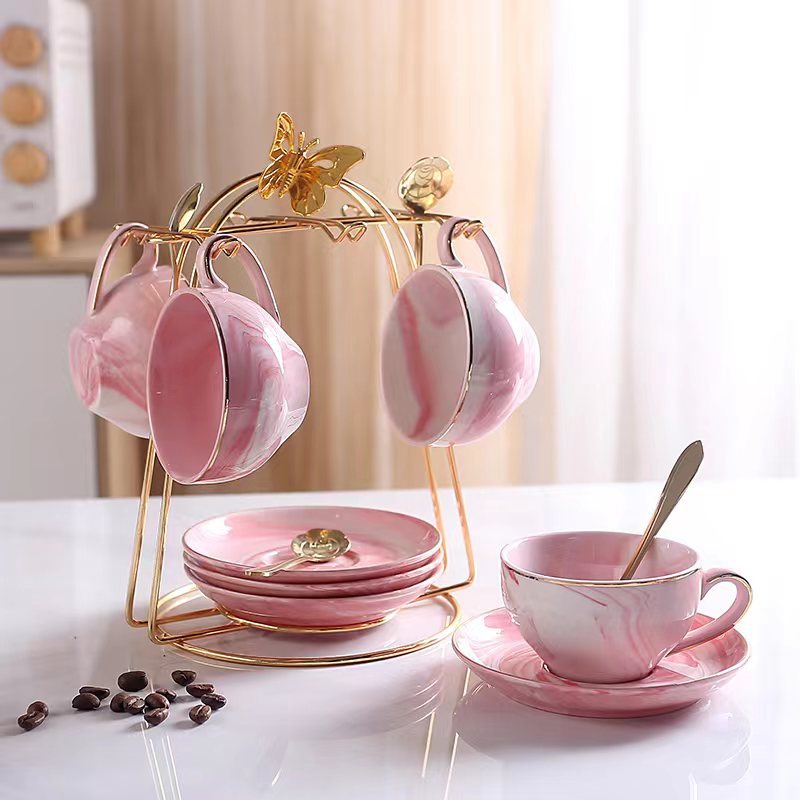 Luz de lujo taza de café traje de estilo europeo de alta apariencia taza y platillo taza de café de cerámica de alta gama exquisito juego de té de la tarde británica