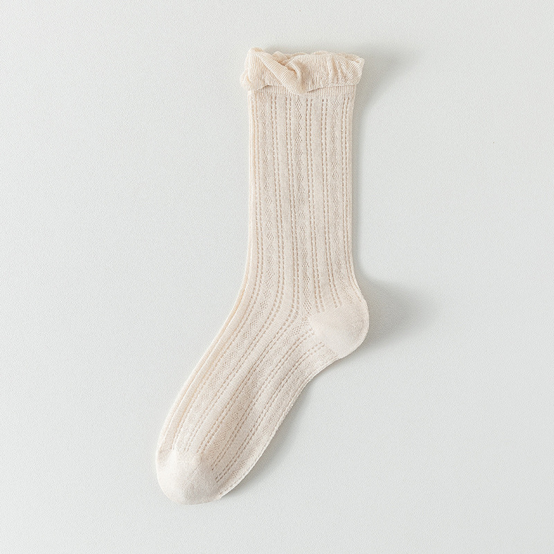 Calcetines de tubo medio Calcetines de algodón de color sólido para mujer delgada de verano Calcetines de confinamiento deshuesados Calcetines de pila de malla Calcetines de mujer Zhuji al por mayor