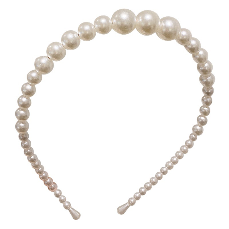 Estilo coreano perla diadema al por mayor nueva presión simple horquilla Internet celebridad versátil dulce alto sentido tocado diadema