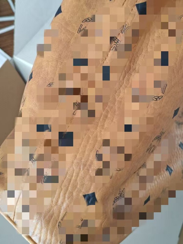 MCの本革の女性バッグの大容量の子供の母の特包のパソコンの枕のカバンは斜めにまたがって野菜のかごを包んで出勤して包みます。|undefined