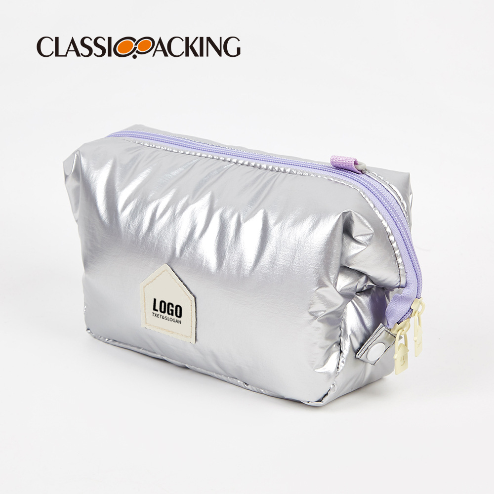 Los fabricantes venden al por mayor bolsas espaciales de otoño e invierno, bolsas de cosméticos de nicho portátiles, bolsas de lavado de moda impermeables para viajes para mujeres, se pueden agregar logotipos