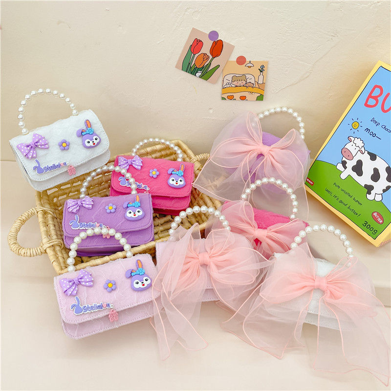 Moda estilo occidental bowknot hombro mensajero bolso lindo bebé monedero todo-Partido mini chica pequeña bolsa