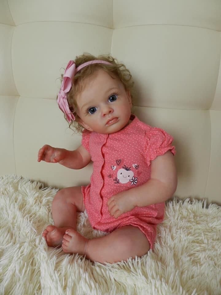 Como se muestra en la imagen de la muñeca