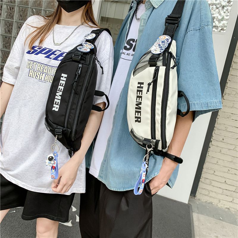 new pattern Inclined shoulder bag Schoolboy A small minority Sense of design outdoors motion Waist pack student The single shoulder bag fashion mobile phone Chest pack