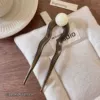 Gray white bead hairpin