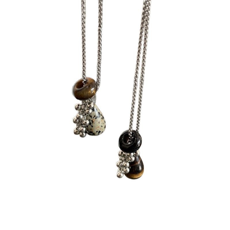Collar colgante de gota de agua de piedra de punto de ojo de tigre, cadena de clavícula de todo fósforo de nicho retro, cadena de suéter de sentido avanzado, collar femenino