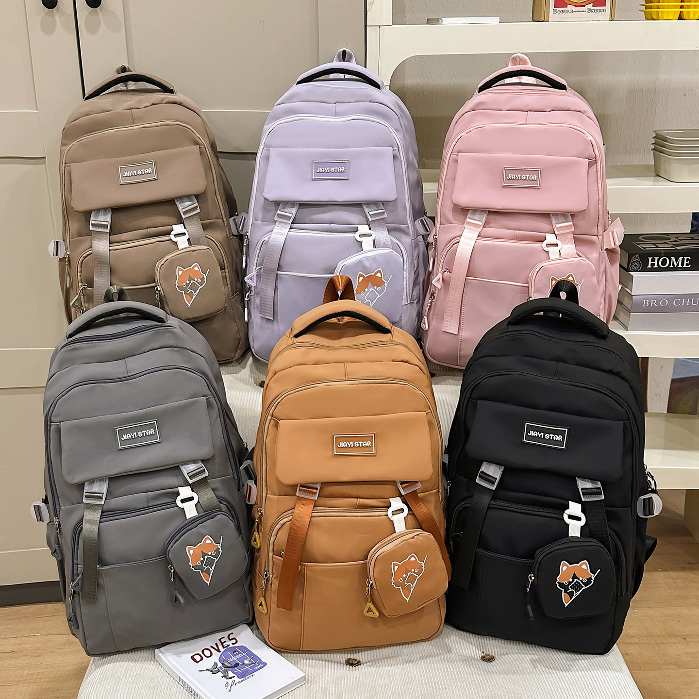 Mochila de estudiantes de secundaria de gran capacidad JIAYISTAR Jiayi nueva mochila de moda ligera y de alto valor en venta