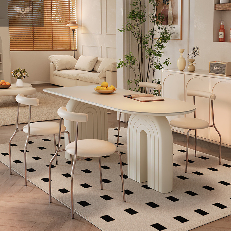 Mesa y silla de comedor de estilo francés de estilo crema de viento de roca, mesa de comedor de la península de diseño moderno y simple.