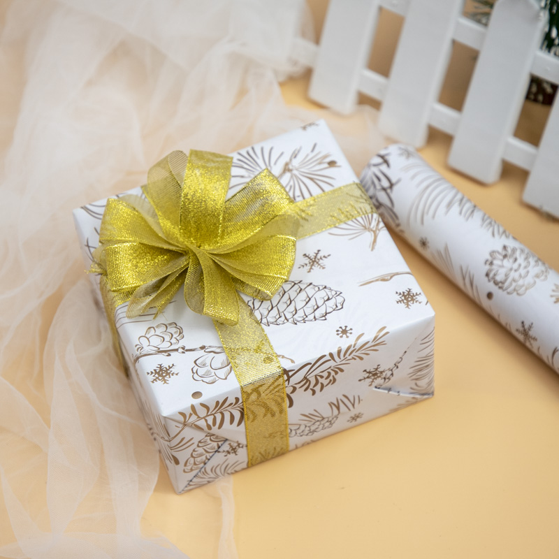 Nuevos productos creativos 10 hojas al por mayor día de Navidad día de Año Nuevo regalo caja de regalo papel de embalaje de papel de Navidad de color artesanal