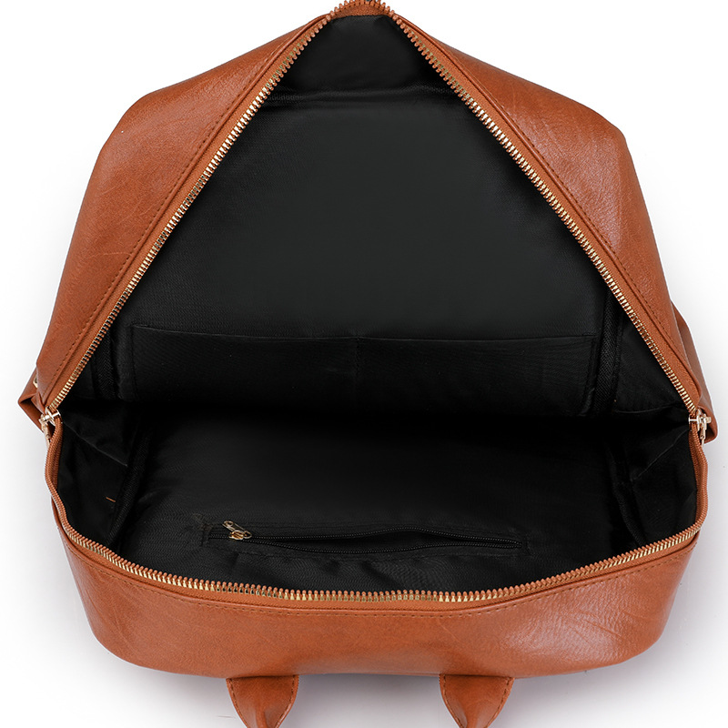 2024 nueva mochila de cuero suave para mujer casual moda retro urbano viaje mochila escolar para estudiantes marea