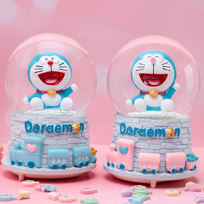 Linda campana tren azul gordo bola de cristal caja de música para niños y compañeros de clase regalo caja de música de nieve brillante