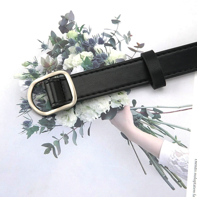 The new round buckle fastener non -perforated lady belt fashion jeans band in summer imitation leather belt spot