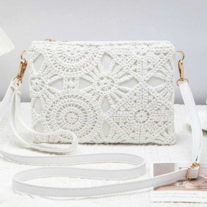 2025 nueva moda hueco flores bolsas de mano de estilo casual bolsas de lujo ligeras cotidianas ventas directas de fábrica