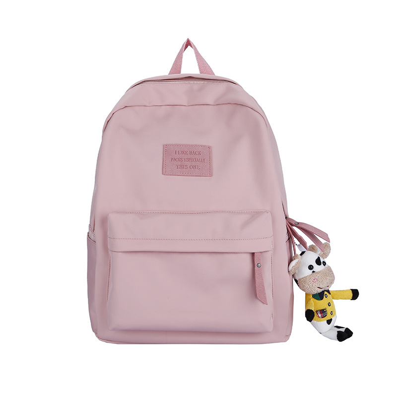 2024 新しいシンプルなバックパックナイロン韓国語バージョン中高生通学日本のキャンパススタイルのバックパック卸売