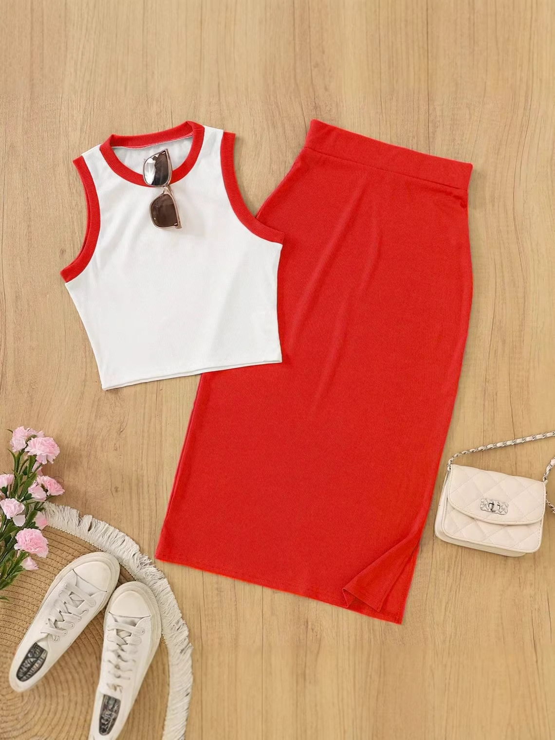 Blusa corta sin mangas de punto roscado para mujeres transfronterizas con traje de falda corta casual y elegante juego de dos piezas