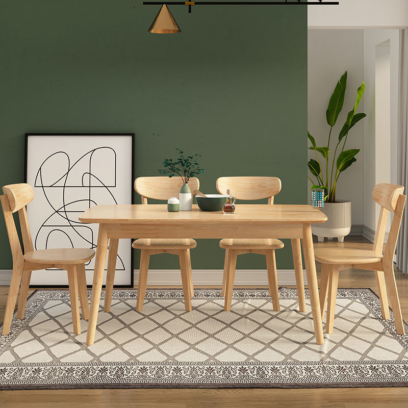 Mesa de comedor nórdica de madera sólida, mesa de comedor doméstica, mesa de comedor rectangular, combinación de una mesa, cuatro sillas, pequeño tipo de casa moderna y simple.