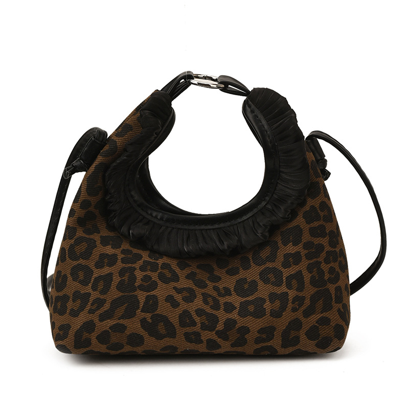 Moda coreana con patrón de leopardo para niñas bolsos de encaje exquisitos mini bolsos de hombro para bebés bolsos de comercio exterior transfronterizos para niños