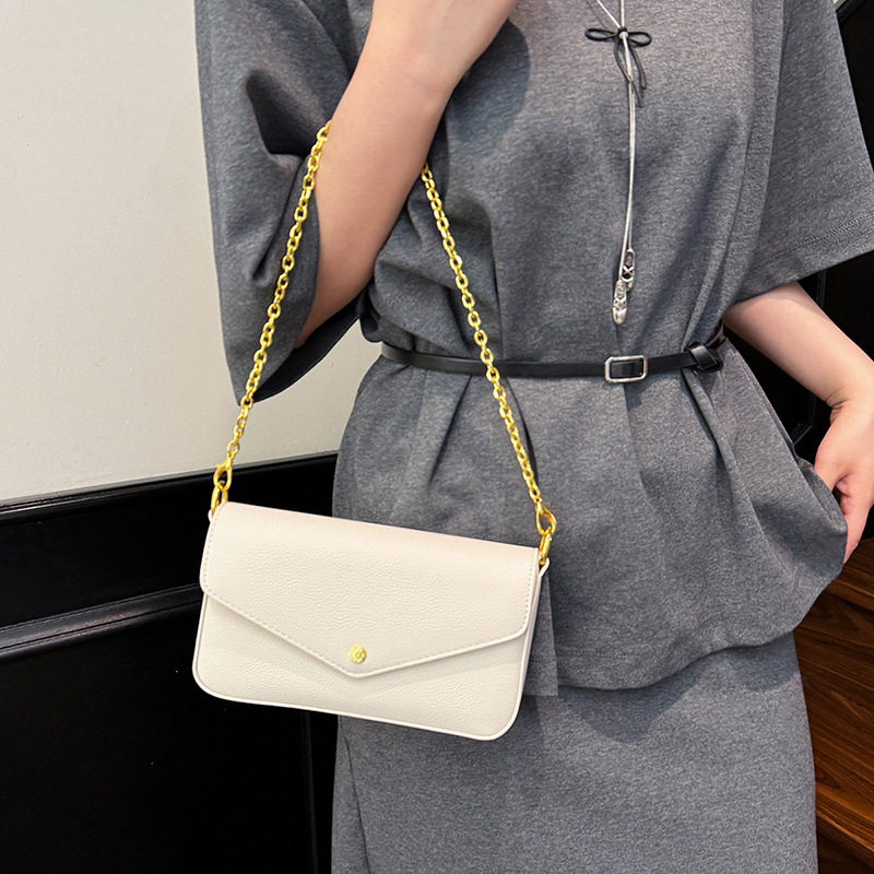 Bolso de cadena popular de este año 2025 verano nuevo bolso de hombro con patrón de lichi bolso de mensajero simple de moda mujer