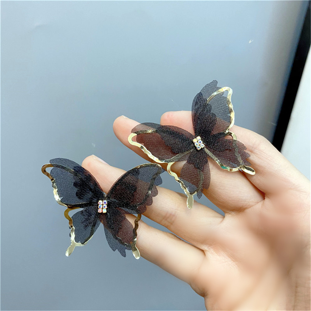Fashion Hollow Butterfly Diamond-studded Earrings display picture 6