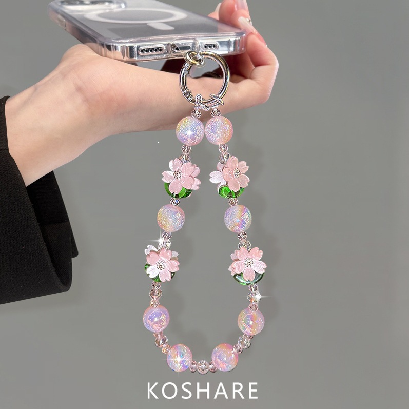 Flor de melocotón brillante cadena de teléfono móvil ligera de lujo de alto nivel colgante de cristal de moda anti-caída colgante de mano perlas para mujeres