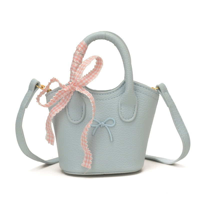 Nuevo bolso para niños coreano simple color sólido bolso de cubo para niños y niñas lindos arco mini bolso de mano bebé
