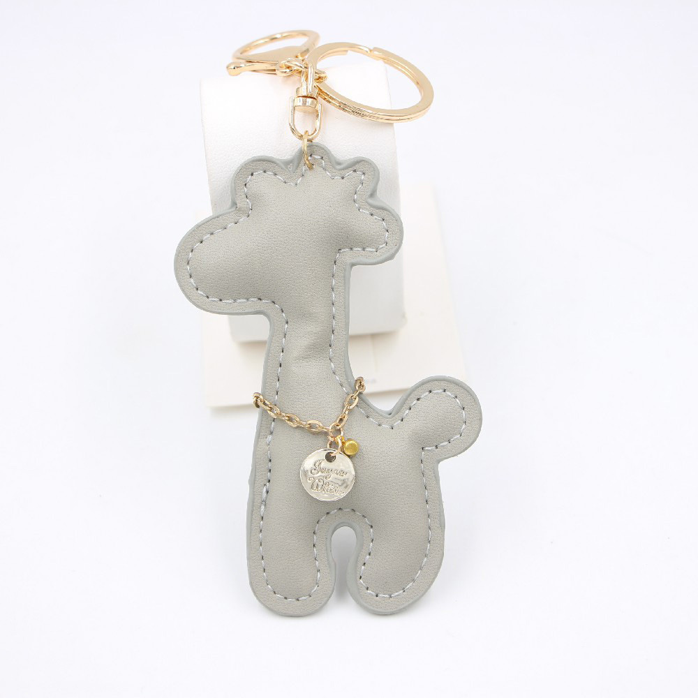 Creative Pu Girafe En Cuir Porte-clés Voiture Pendentif Dessin Animé Animal Cerf Cartable Pendentif En Gros display picture 7