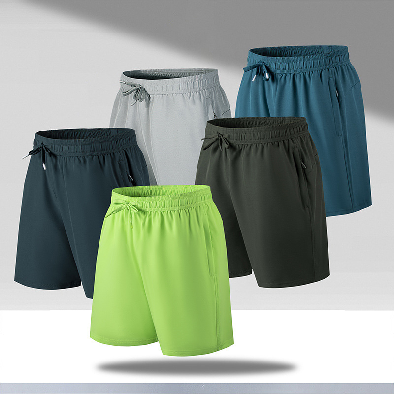 2023 nuevos pantalones cortos para hombres secos rápidos sueltos cinco pantalones casuales deportivos delgados transfronterizos fábrica de pantalones de playa de seda