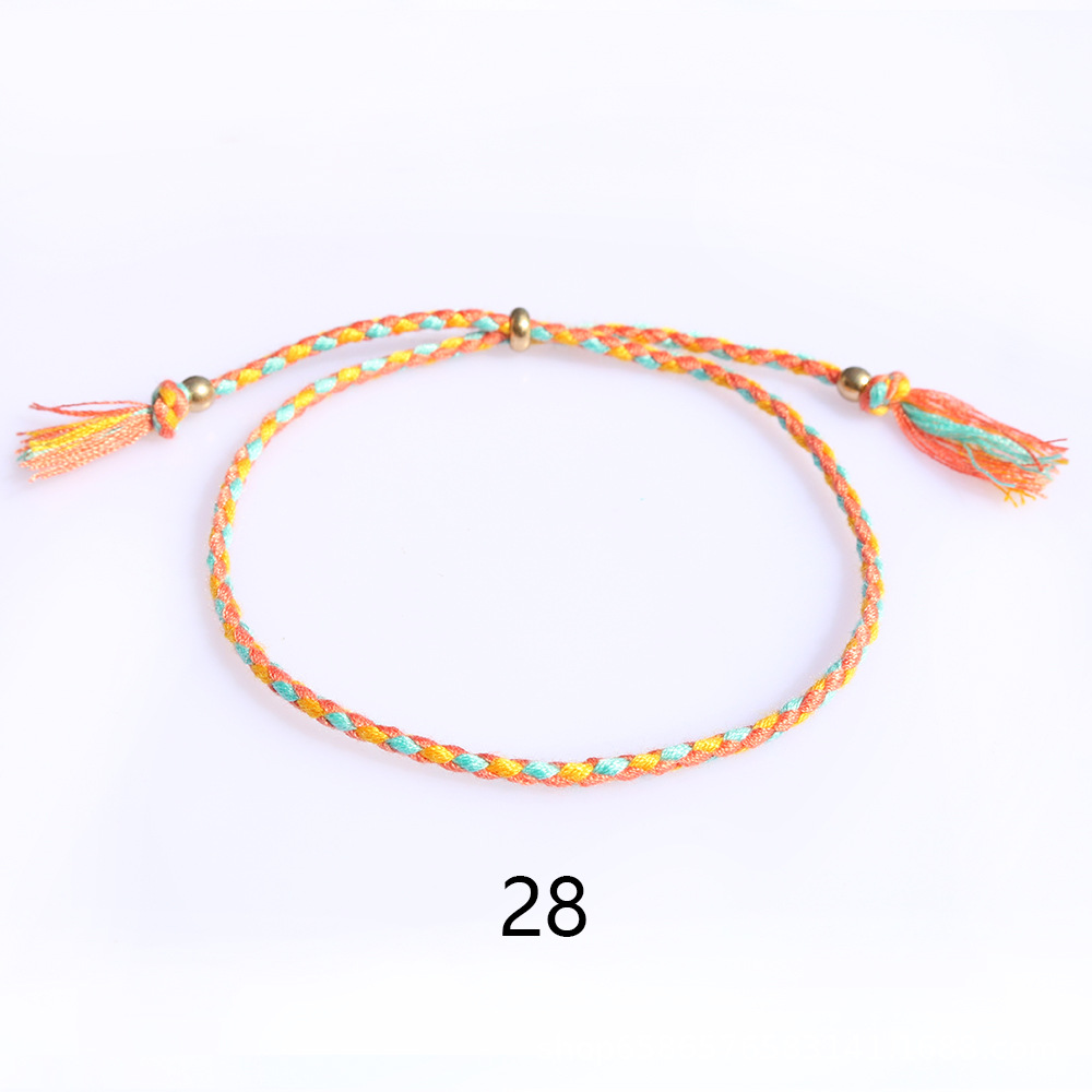Amazon popular colorido cuerda de algodón amistad pulsera perlas de cobre borla pulsera tejida a mano ajustable hombres y mujeres pulsera