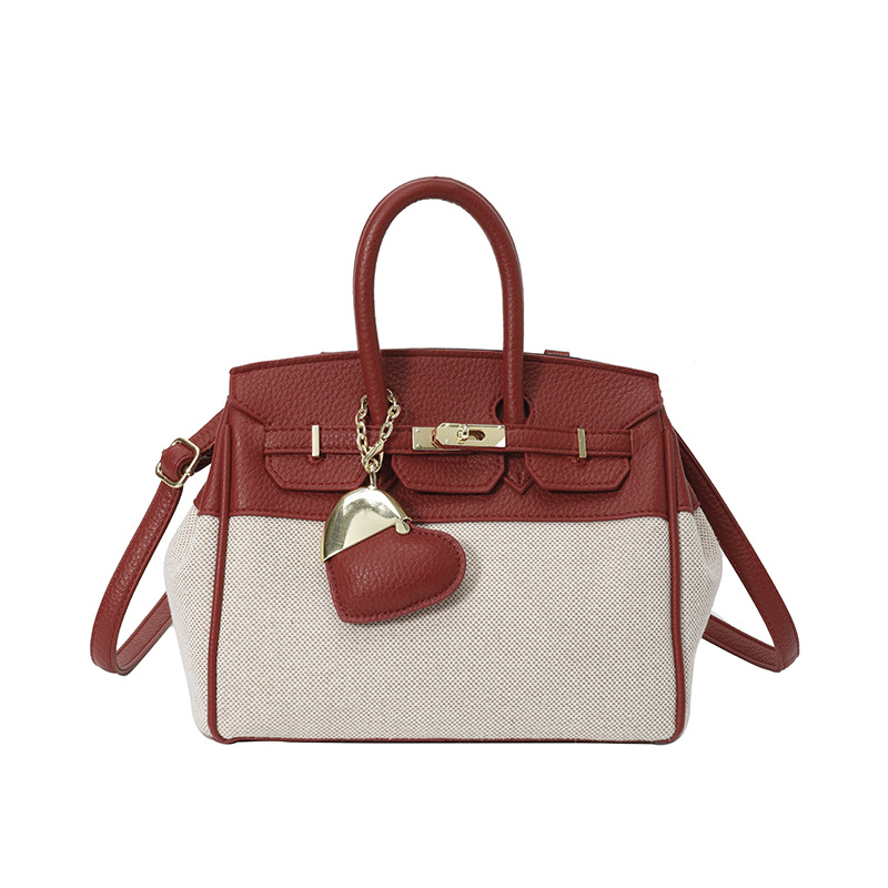Bolso de tela de mujer color contrastante empalme bolso portátil Kylie bolsa de gran capacidad transfronteriza alta sensación de viaje bolsa de mano