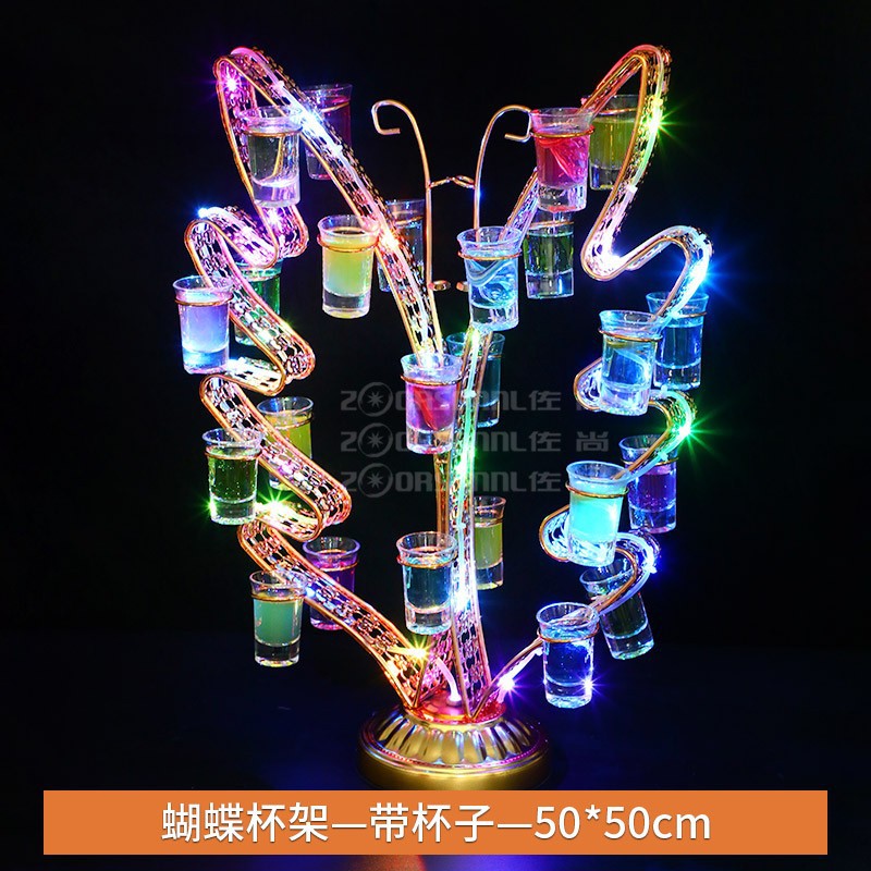 Portavasos de mariposa con taza