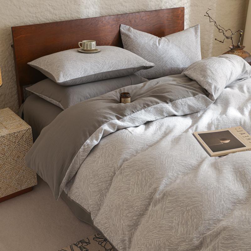 Cama de algodón molido de algodón largo conjunto de cuatro piezas de algodón puro 2025 nuevo lujo ligero de alta sensación sábanas cubierta de tres piezas