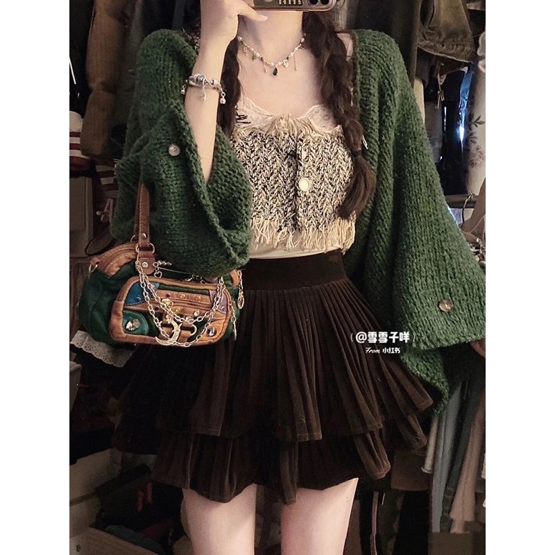 Three-piece set, slimming autumn/winter new style, featuring a pure and alluring knitted cardigan sweater, a Chanel-inspired camisole, and a skirt.