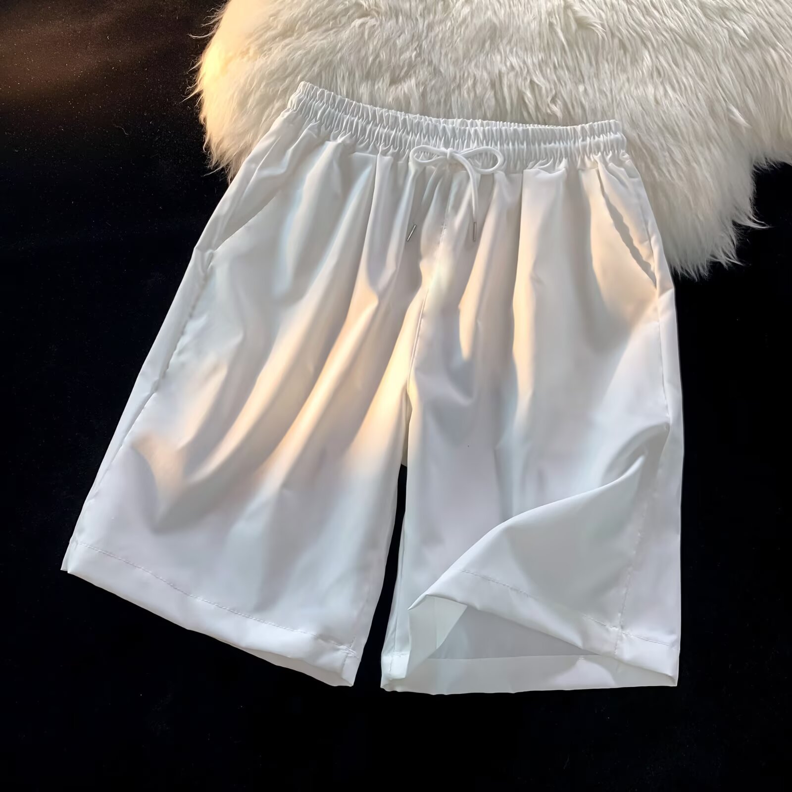 Personalizado al por mayor caramelo de viento neutro multicolor 25 colores primavera y verano nuevos pantalones cortos casuales de cinco puntos sueltos y cómodos