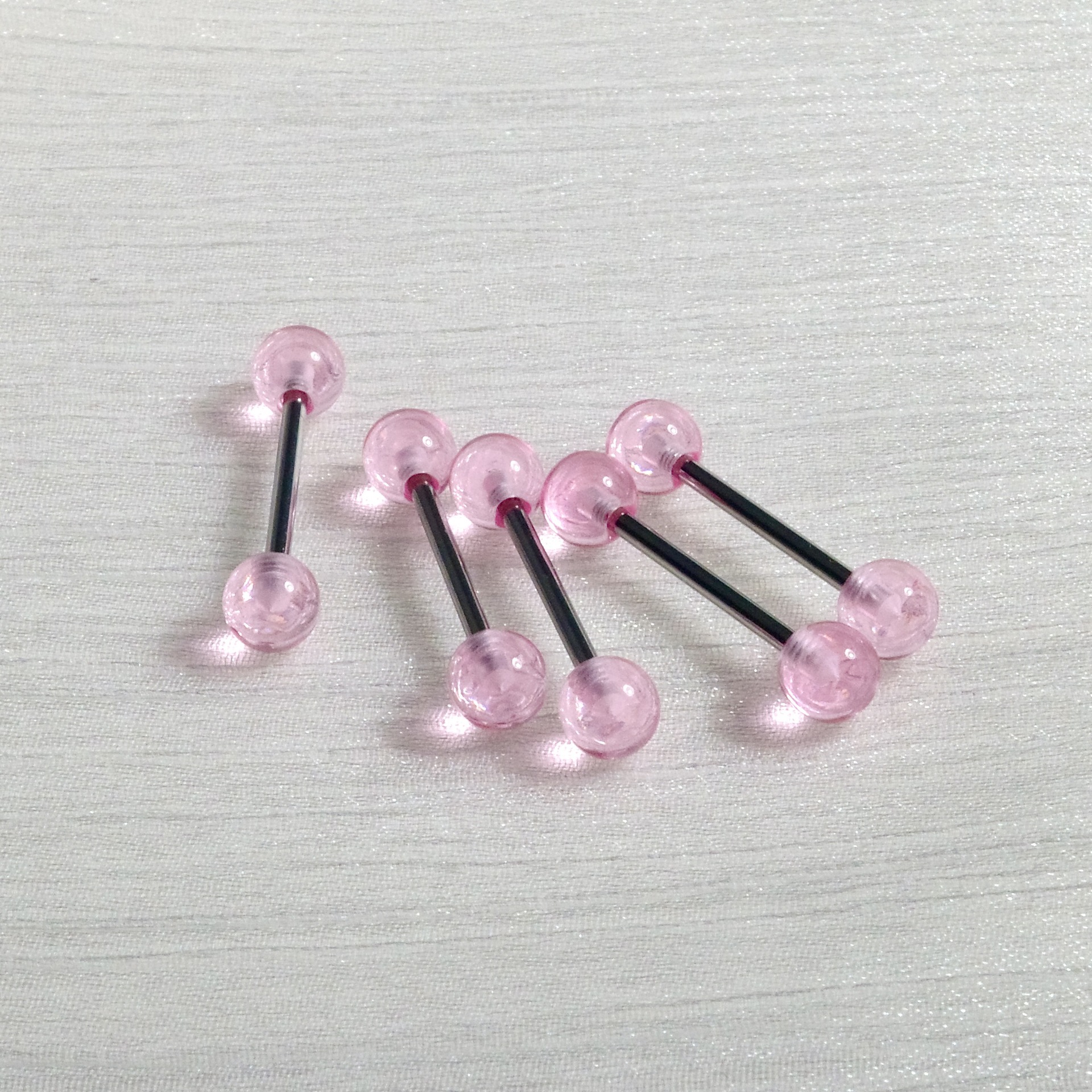 Silver pointed spike labret stud material detail