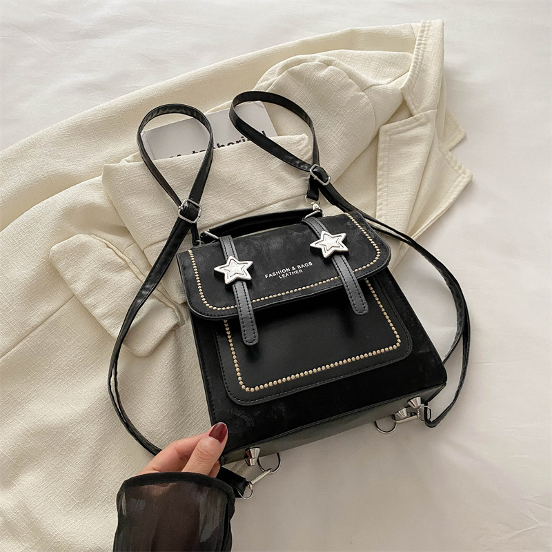 Mochila pequeña 2024 nuevo estilo de diseño de moda nicho de viaje bolsas escolares ligeras para mujeres ins para salir mochila pequeña