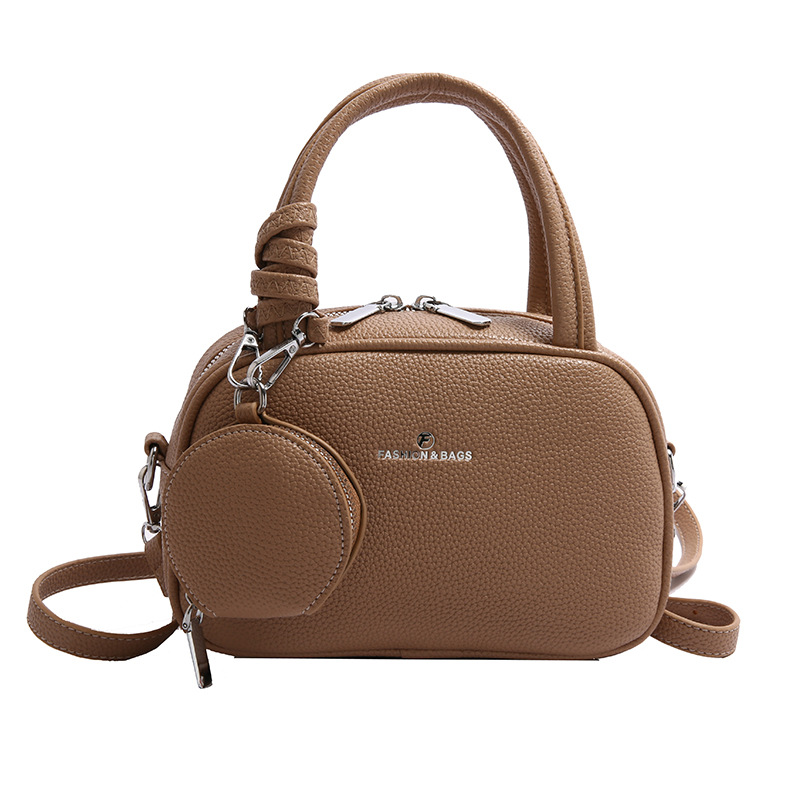 Bolso de moda coreano 2025 primavera y verano nuevo bolso femenino bolso de hombro con patrón de lichi simple bolso de mensajero de letras casuales