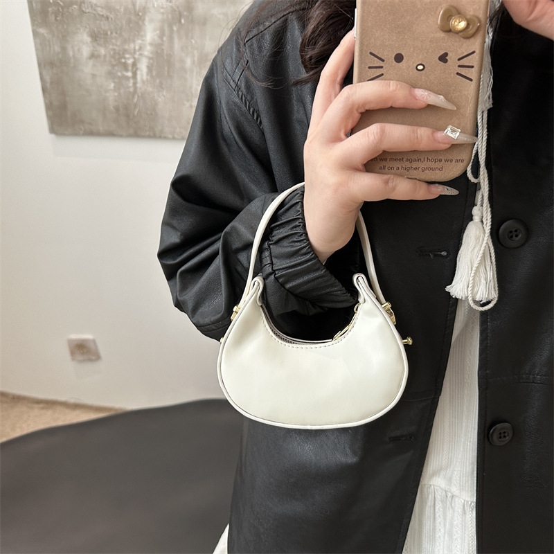 2025 primavera y verano nuevo estilo estampado de leopardo marea bolso de media luna moda estilo occidental textura bolso personalizado estilo ins mini bolso