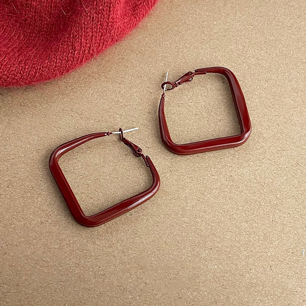 Pendientes de aleación coreanos Pendientes largos de alta calidad de perlas Pendientes de puesto al por mayor transfronterizo Pendientes exagerados de lujo ligero Mujeres