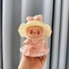 White wavy straw hat + pendant milk brown candy skirt