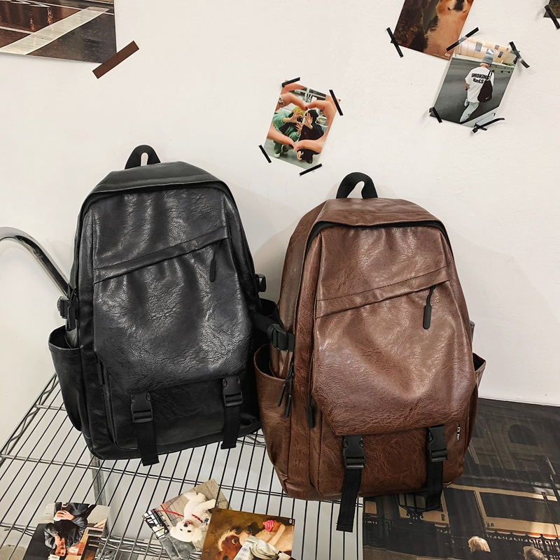 Transfronterizos al por mayor retro bolsas escolares de moda en mochila de parejas mochila de gran capacidad de la escuela secundaria coreana