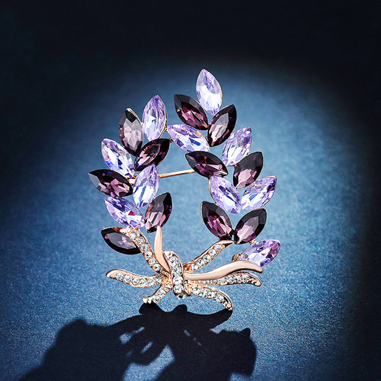 Nuevo cristal Bauhinia bouhinia broche de gama alta temperamento femenino anti-exposición pin diamante incrustado oído de trigo ramillete traje Accesorios