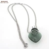 Dark green-peach heart bottle