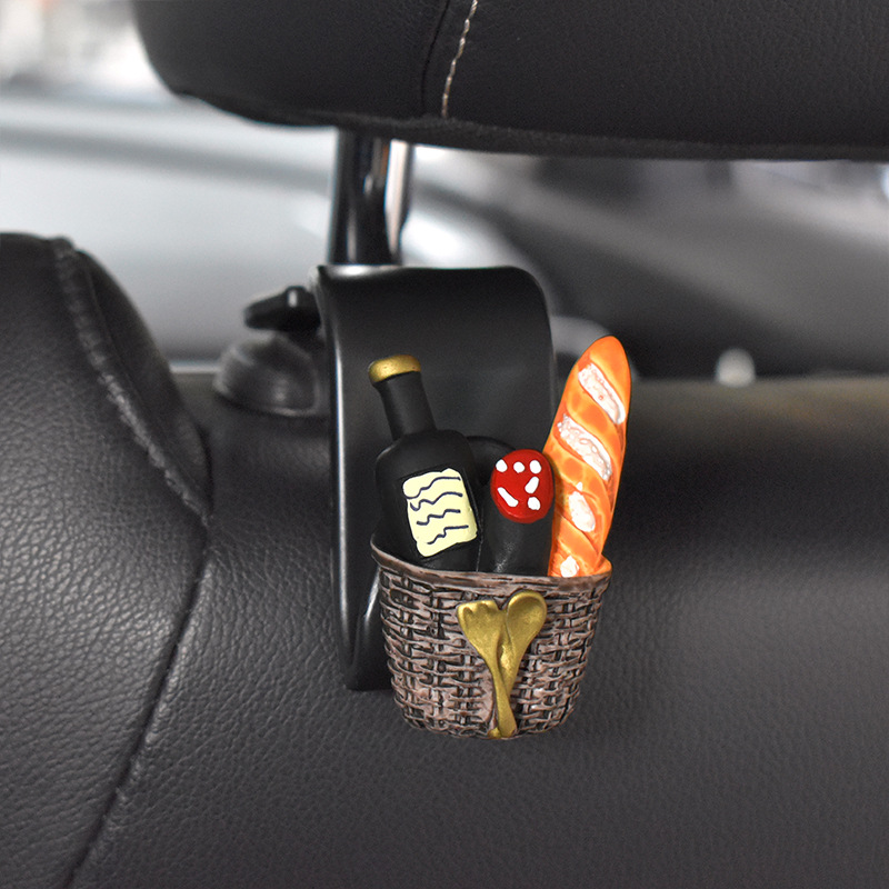 Gancho trasero del asiento del automóvil 2024 nuevo gancho pequeño multifuncional para automóvil lindo gancho para colgar en el automóvil de dibujos animados trasero
