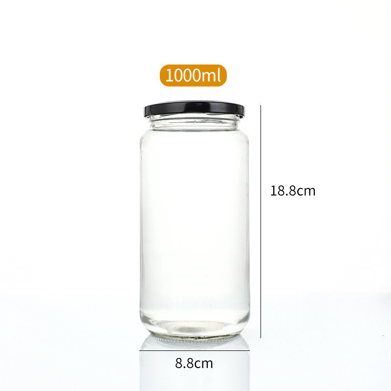 Botella de salsa redonda resistente a altas temperaturas sellada transparente resistente a altas temperaturas botella de melocotón amarillo enlatada botella de miel frutas botella de vidrio spot