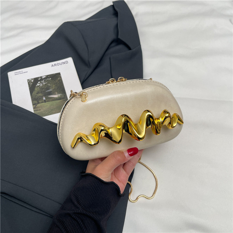 Bolso de mano de moda europea y americana personalidad para mujeres 2025 nueva cadena de moda bolso de cena bolso de hombro bolso de caja diagonal