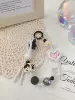 3D bead black with bow, a mobile phone clip, another shot