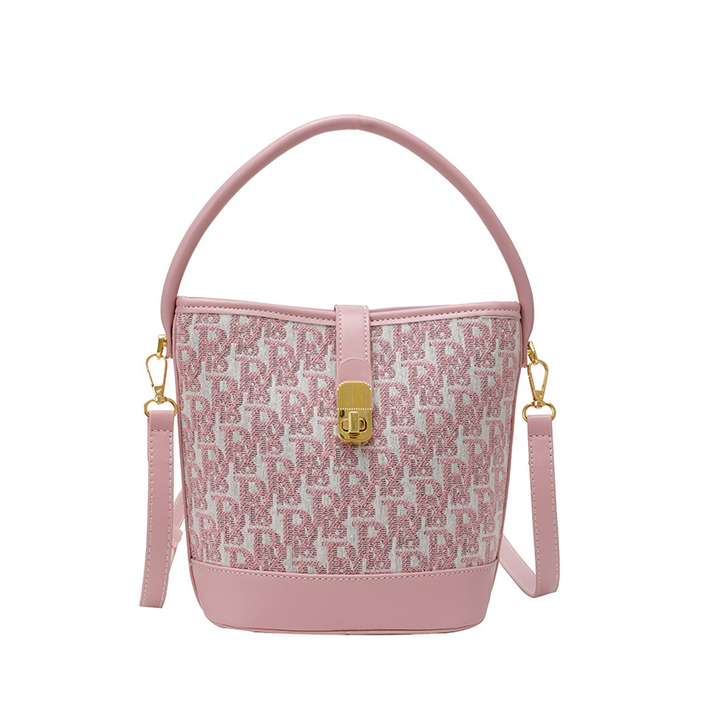 Bolso de mano exquisito de alta gama para mujer 2025 nuevo bolso de cubo retro con estampado de tela bolsa de mensajero de un solo hombro de nicho