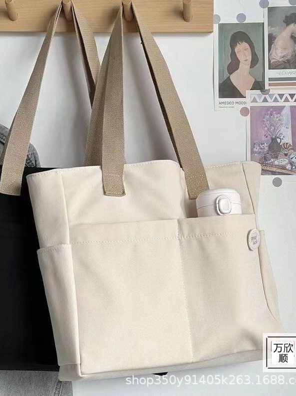 Diseño original bolso de tote de lona gruesa con cremallera japonesa para viajeros, bolso de hombro simple para estudiantes de arte informal